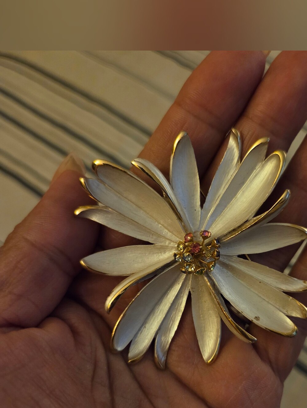 Gold-Edged Cream Floral Brooch with Multi-Tone Gem Center